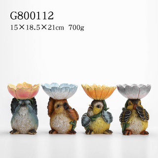 4/A Polyresin Bird with Flower on Top Birdfeeder